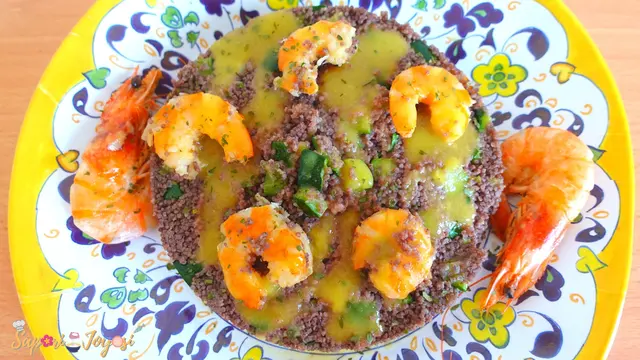 Cous cous venere con zucchine e mazzancolle